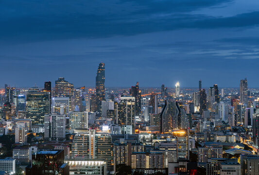 Aerial view of Night Bangkok metropolis in Thailand , cityscape background	
