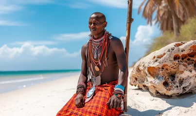 Fototapeten Masai dressed in traditional clothes along the beach, Zanzibar, Tanzania © STORYTELLER