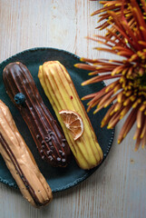 Lemon, chocolate and caramel eclairs 