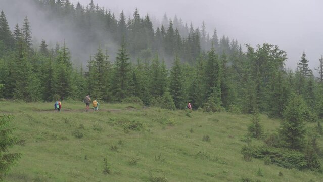 Descent of tourists from the Carpathian mountains.