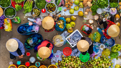 Aerial view of busy local daily life of the morning local market in Vi Thanh or Chom Hom market, Vietnam