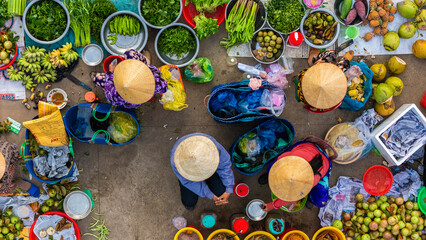 Aerial view of busy local daily life of the morning local market in Vi Thanh or Chom Hom market,...