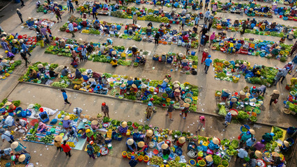 Aerial view of busy local daily life of the morning local market in Vi Thanh or Chom Hom market,...