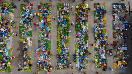 Aerial view of busy local daily life of the morning local market in Vi Thanh or Chom Hom market, Vietnam