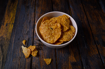 Tempeh chips are a food made from tempeh which is thinly sliced and then fried using seasoned flour. Usually the taste is salty with a savory onion aroma.
