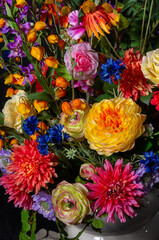 close up of colored silk flowers