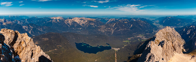 High resolution stitched alpine summer panorama with Lake Eibsee at Mount Zugspitze, Top of...