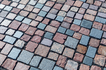 detail of colorful cobblestoneat the sidewalk