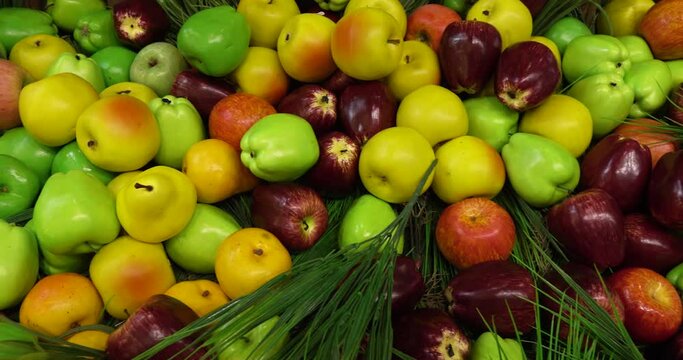 Apples and pears. A vivid close-up of colorful fruits. Ideal for the concept of a healthy lifestyle.