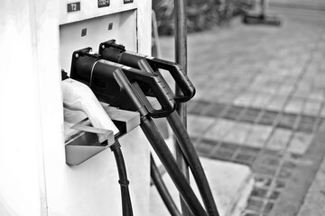 EV Car Charging station , EV fuel nozzles , Black and white scene 