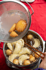 making Guangdong-style crispy pastry dumplings for Chinese New Year at vertical composition