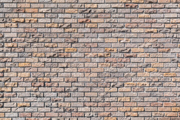 Brick wall of red and yellow color, old brick wall texture background - outdoor setting