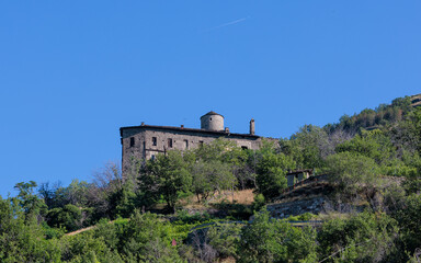 Nus Castle and blue sky in summer un the mountain