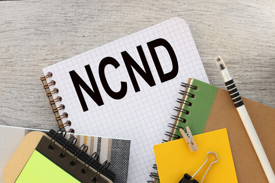 NCND various office supplies. pencil points to text