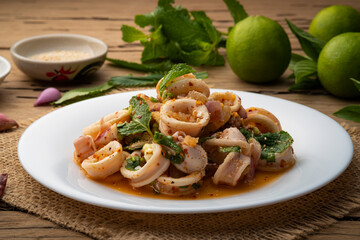 Squid Spicy Salad with Herbs,Hot and Sour Squid with Chilli, Mint leaf and Coriander in lime sauce (Yam pla muk)