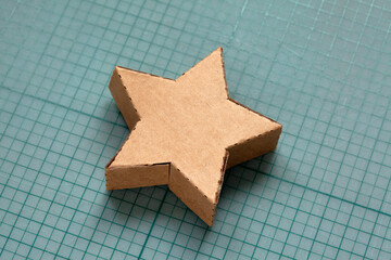 real 3d cardboard star shape box - design template.