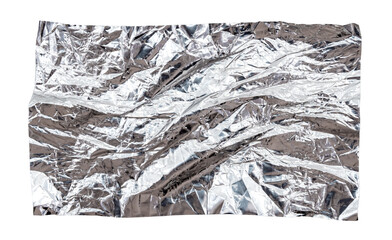 Naklejka premium A piece of crumpled silver foil on a white background. Isolate foil