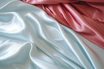 Bed covered in a pink and blue blanket. Suitable for home decor or interior design concepts