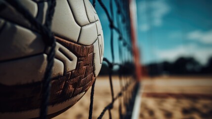 A close up shot of a soccer ball in a net. Perfect for sports-related designs and projects