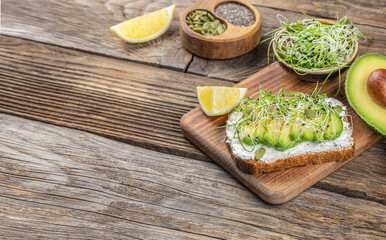 Avocado Toast with rye bread, pumpkin seeds. Vegetarian food. Vegan menu. Food recipe background. top view. copy space for text