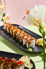 Eel and Avocado Roll Topped with Shrimp and Unagi Sauce. A surreal fusion of flavors and visual appeal for gourmet menus
