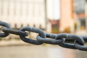 Iron chains with a blurred background