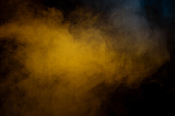 Blue and yellow steam on a black background.