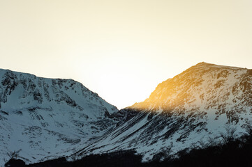 Stream of meltwater on the heights of a snowy mountain. Ushuaia Emerald Lagoon in winter