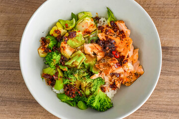 Healthy fresh meal with vegetables, chicken, rice on plate. Homemade delicious lunch with chicken, broccoli for restaurant, menu, advert or package, close up selective focus. Top view.