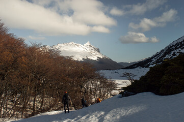 People doing winter trekking, snowy Andes mountains. Ushuahia, Patagonia