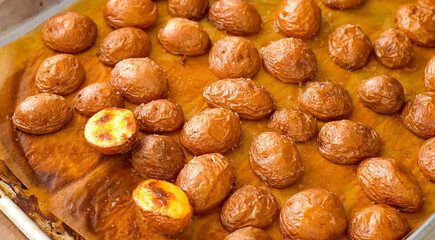 Roasted potato on plate. Homemade cooking fresh baked potato, serving food for restaurant, menu, advert or package, close up, selective focus