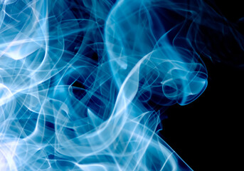 Blue smoke on black isolated background