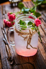 fresh mojito on a rustic table.