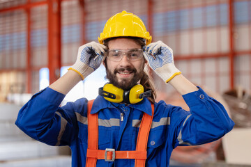 Engineer wearing safety eye glasses before work