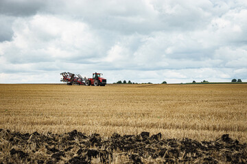 Tractor working in the field in Ukraine