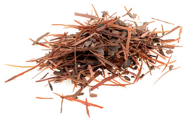 Pile of natural Taheeboo dry tea isolated on a white background. Lapacho herbal tea. Tabebuia heptophylla.