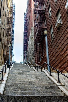 Vertical photo of the Joker stairs in the famous Bronx neighborhood of New York in the United States of America.