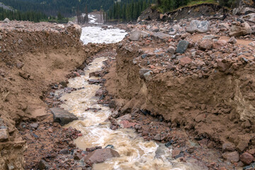 Natural disasters concept: riverbed after mudflow in the mountains