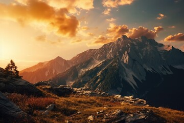 Sun setting over a beautiful mountain range. Perfect for nature and landscape photography.