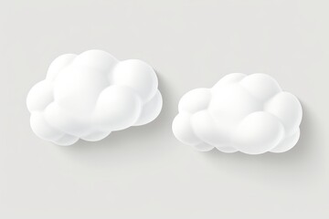 Two white clouds on a gray background. Suitable for various design projects