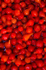 Biquinho pepper or Chinese capsicum. Very traditional in Brazil. Red pepper texture, seasoning