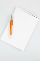 notepad and pencil, notebook and pen, notebook and pencil