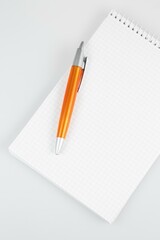 notepad and pencil, notebook and pen, notebook and pencil