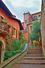 Fototapeta na wymiar alley in the historic center of Verona which leads from the Pietra bridge to Castel San Pietro in Veneto, Italy 