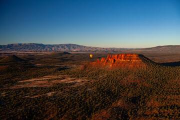 Yellow Hot Air Balloon over Red Rock Formation in Sedona, Arizona