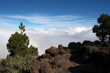 Amazing views with clouds above mountains from peak Pico Corralejo, around National Park Caldera de Taburiente, La Palma, Canary Islands, Spain
