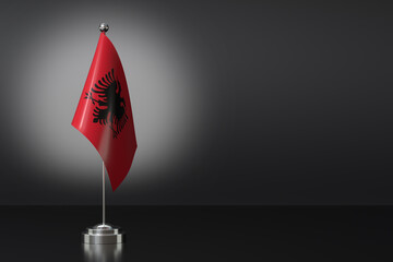 Small National Flag of the Albania on a Black Background. 3d Rendering