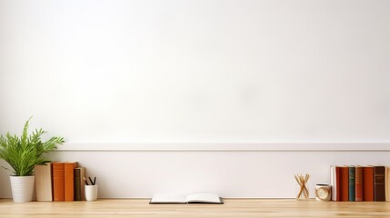 Workspace - an office desk, an empty table with books, notebooks and supplies on a white wall background, a place to copy text or a showcase with goods