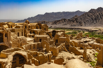 Iran, Yazd province. Village of Kharanaq dating back to 4500 years ago. The old town, also known as Kharanaq Castle, one of the largest adobe structures (earth, clay and organic materials) in Iran