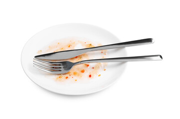 Dirty plate and cutlery on white background